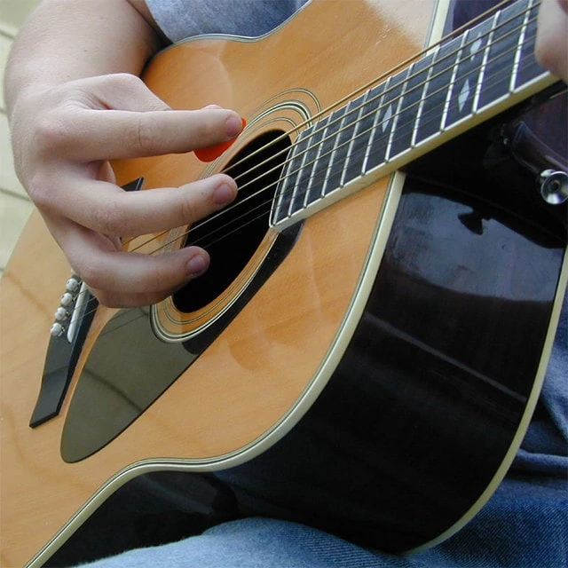 an-acoustic-guitar-1480141-640x640